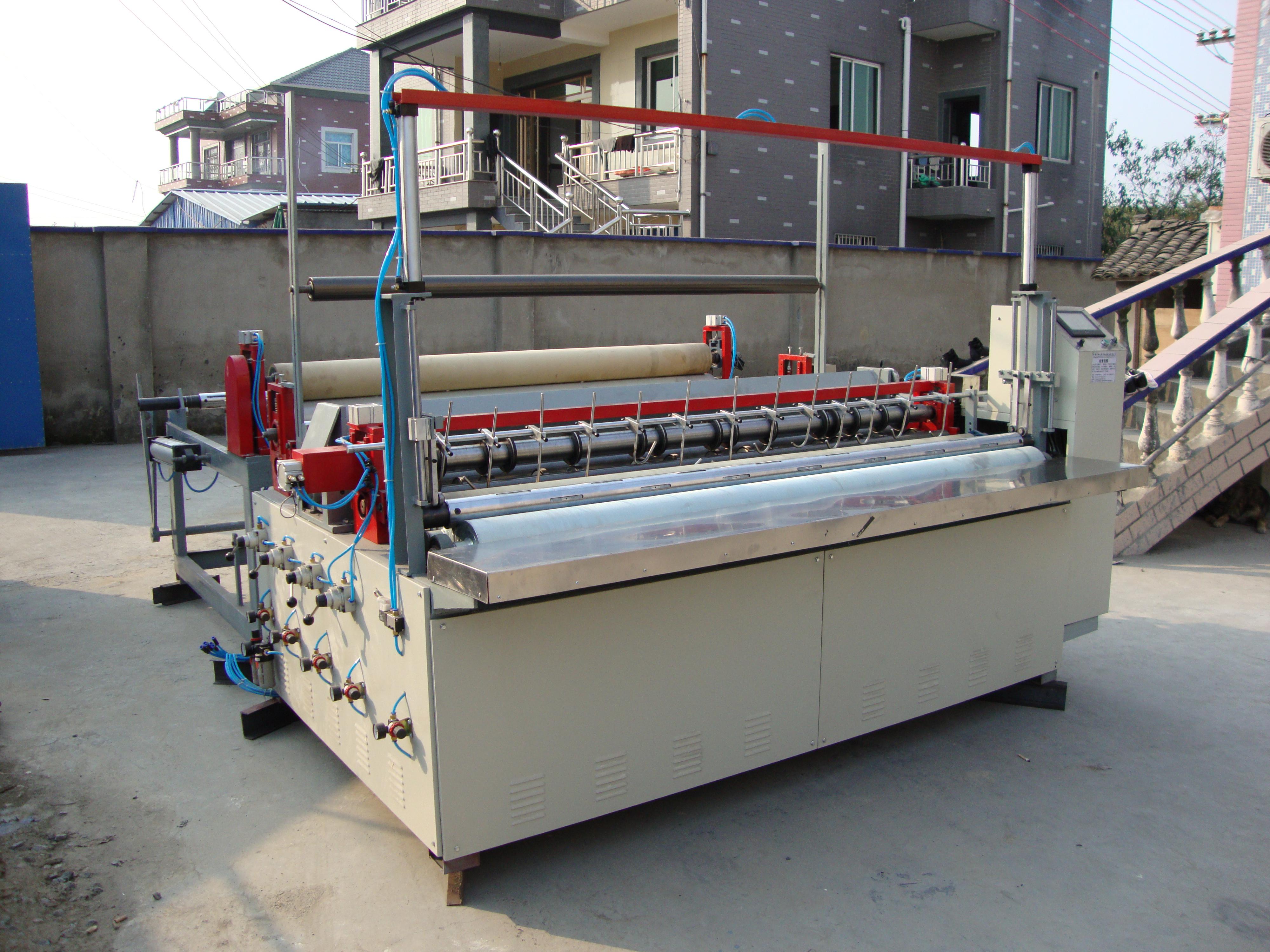 無紡布點(diǎn)斷分切復(fù)卷機(jī) 無紡布點(diǎn)斷分切復(fù)卷機(jī)